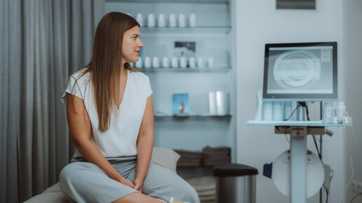 Woman during bone density measurement