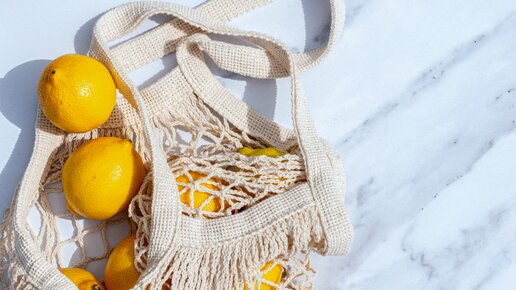 Vitamin C haltige Orangen in Netztasche